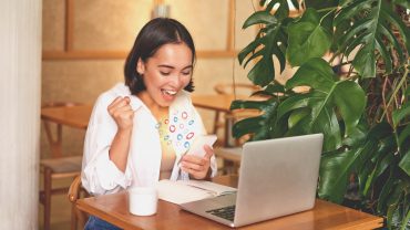Asian Woman Interactions On Mobile Phone, Concept With Notification Icons Of Like, Message, Email, Comment And Star Above Smartphone Screen, Person Hands Holding Device, Internet Digital Marketing.